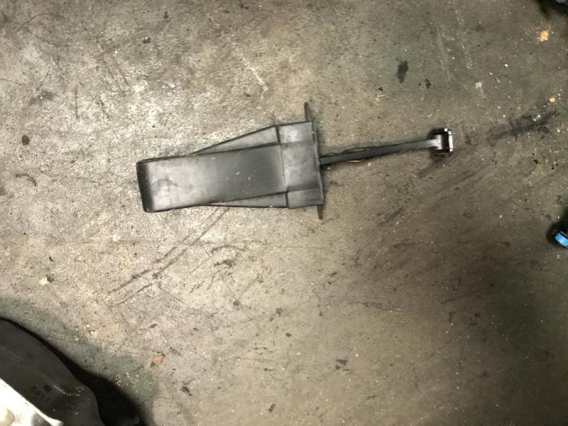 Door check strap stopper