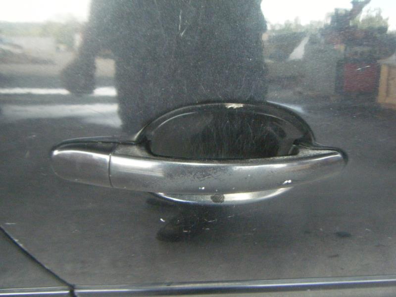 Poignee porte avant droit
