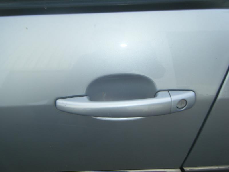 Poignee porte avant gauche