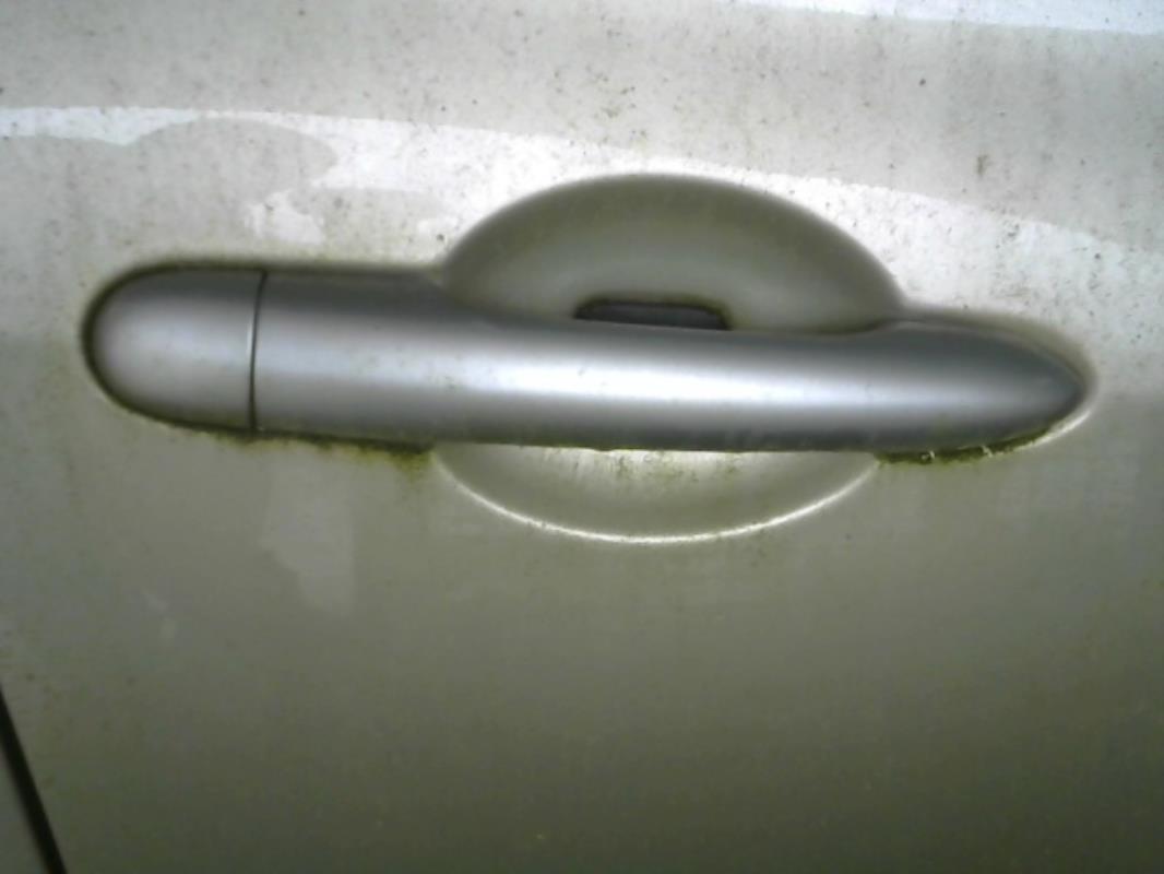 Poignee porte avant droit