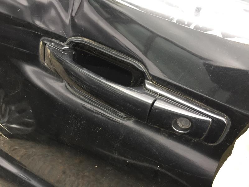 Poignee porte avant gauche