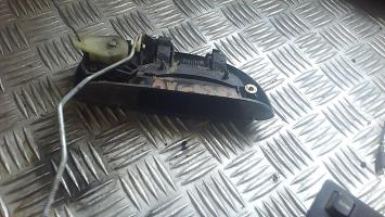 Poignee porte avant gauche