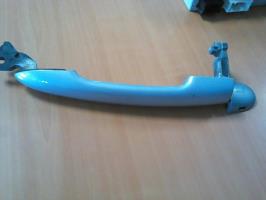 Poignee porte avant gauche