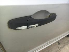 Poignee porte avant droit