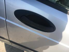 Poignee porte avant droit