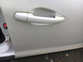 Poignee porte avant droit