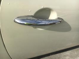 Poignee porte avant droit