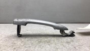 Poignee porte avant gauche
