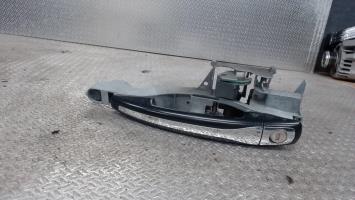 Poignee porte avant gauche