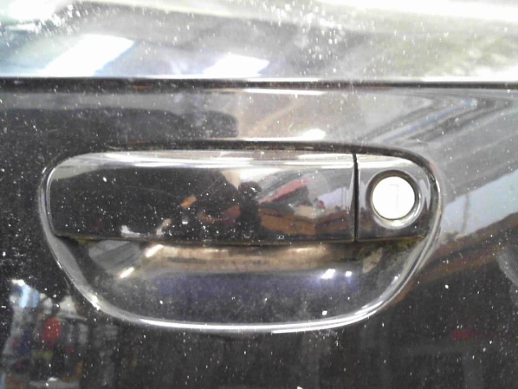 Poignee porte avant gauche