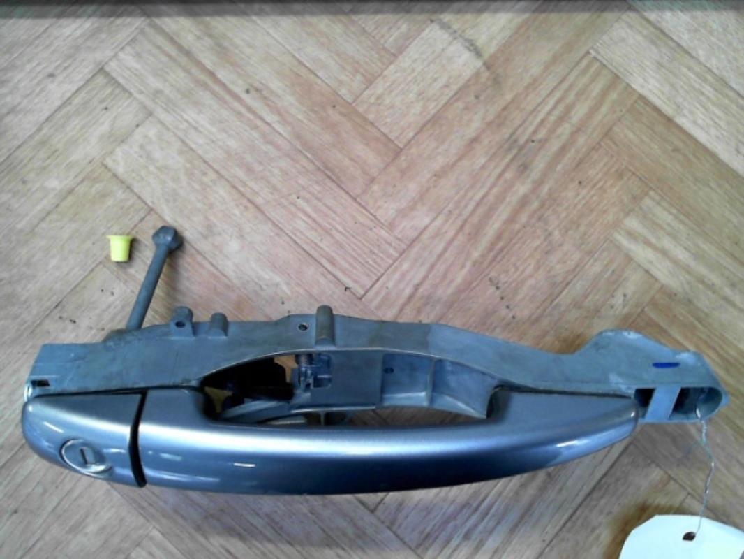Poignee porte avant gauche