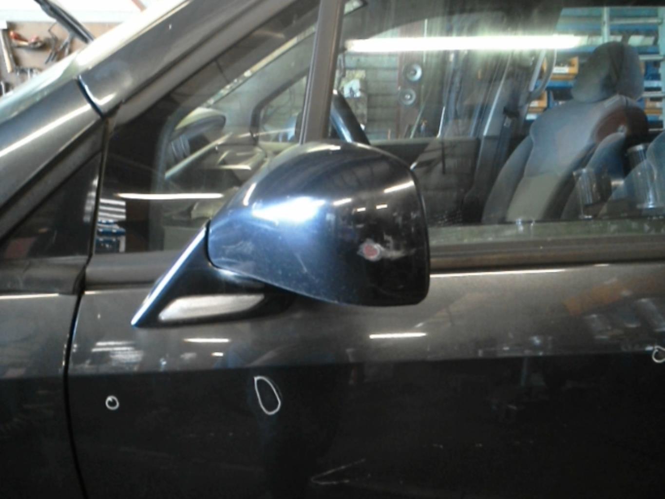 Poignee porte avant gauche