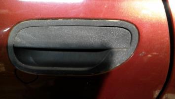 Poignee porte arriere gauche