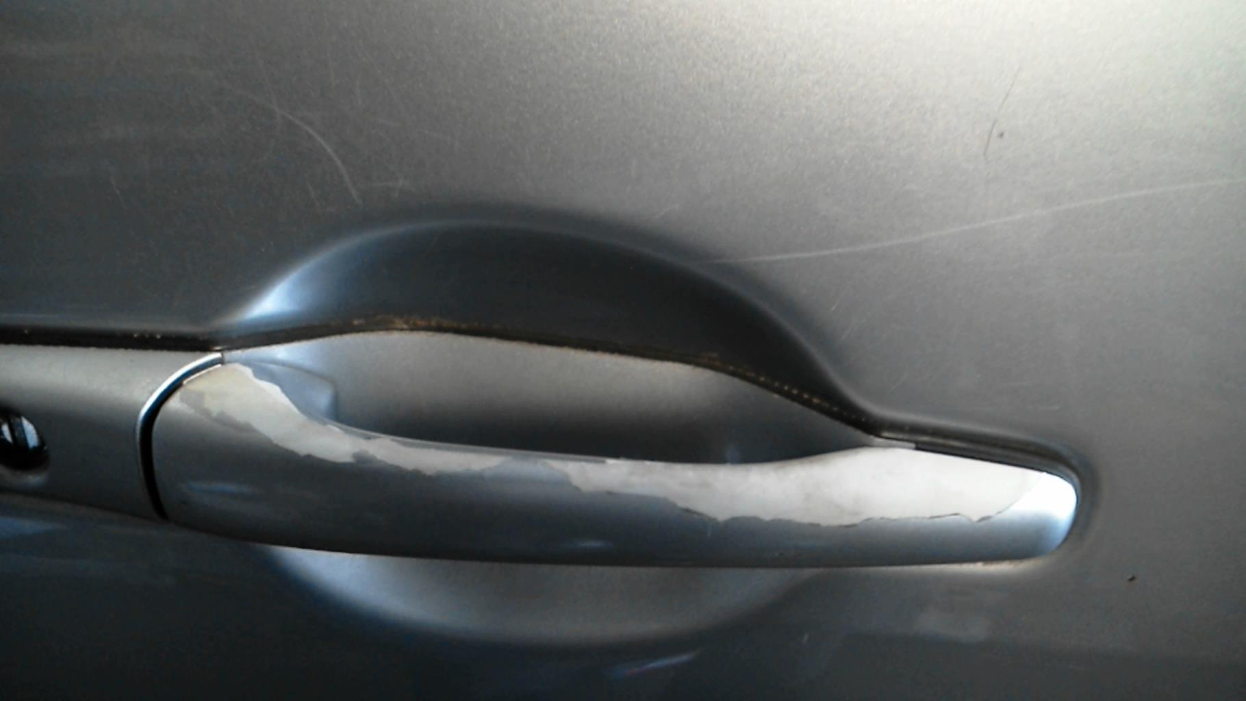 Poignee porte avant droit