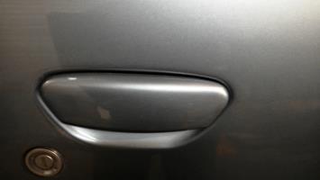 Poignee porte avant droit
