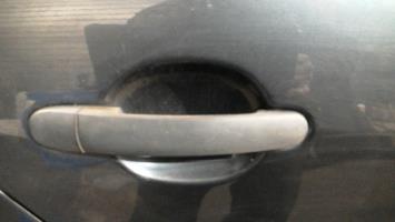 Poignee porte arriere droit