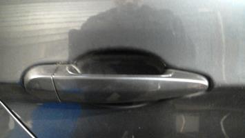 Poignee porte arriere droit