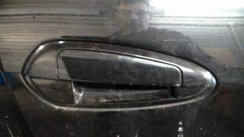 Poignee porte avant droit