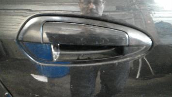 Poignee porte arriere droit