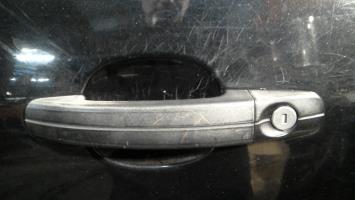 Poignee porte avant gauche