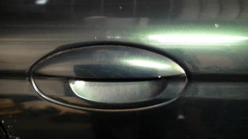 Poignee porte avant droit