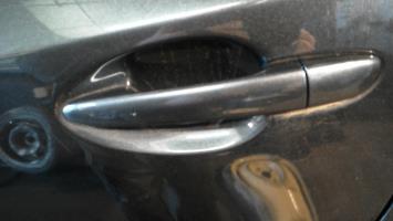 Poignee porte arriere gauche
