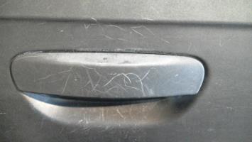 Poignee porte avant droit