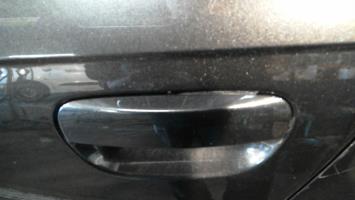 Poignee porte arriere gauche