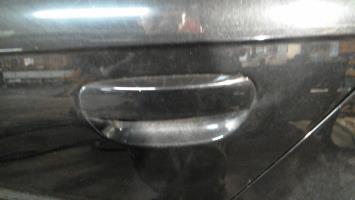Poignee porte arriere gauche