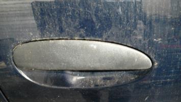 Poignee porte avant droit