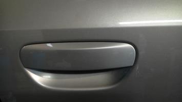 Poignee porte avant droit