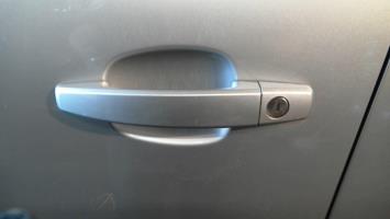 Poignee porte avant gauche