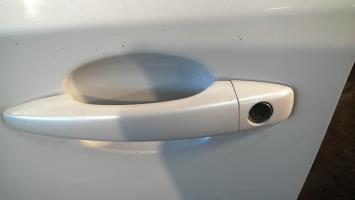 Poignee porte avant gauche