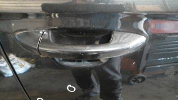 Poignee porte avant droit