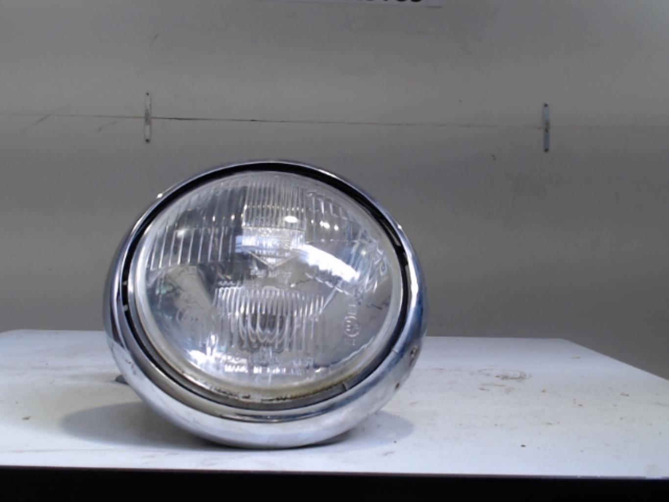 Optique avant principal gauche (feux)(phare)