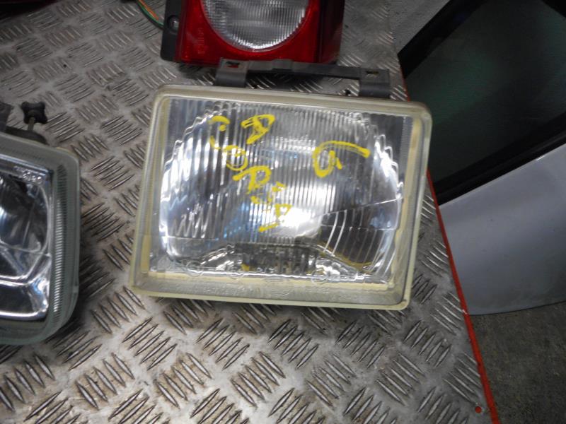 Óptica delantera principal izquierda (luces) (faro)