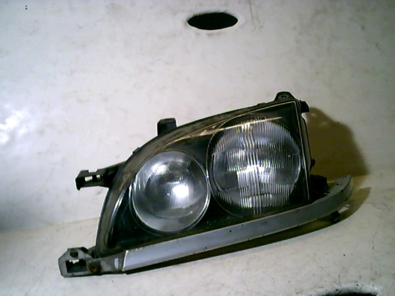 Optique avant principal gauche (feux)(phare)