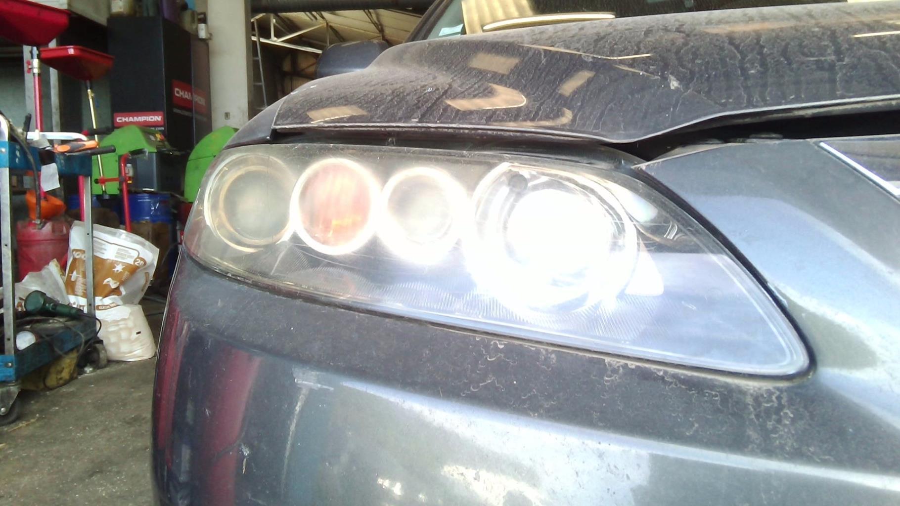 Óptica delantera principal derecha (luces) (faro)