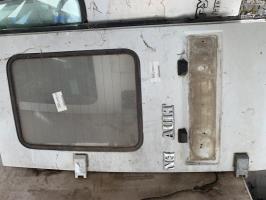 Porte de coffre gauche