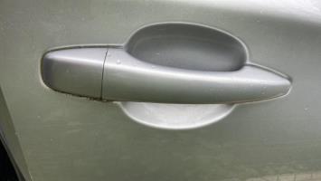 Poignee porte avant droit