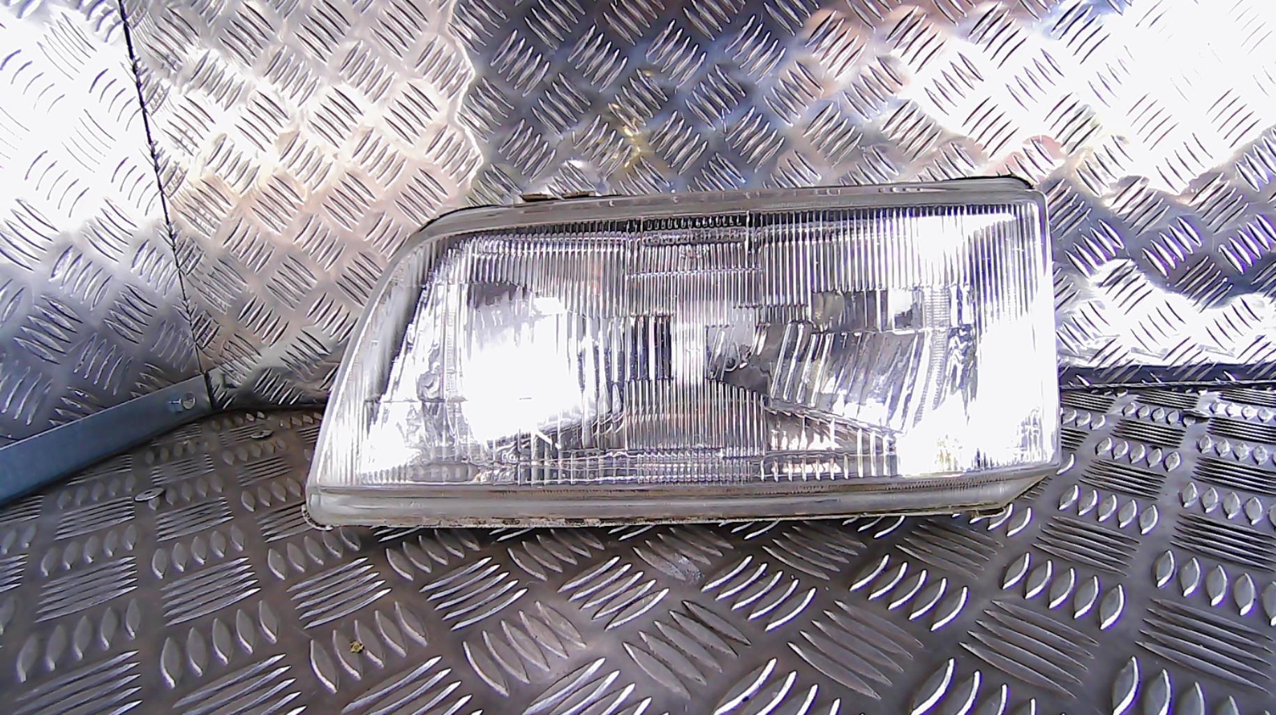Optique avant principal gauche (feux)(phare)