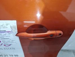 Poignee porte avant gauche