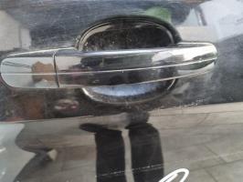Poignee porte avant droit