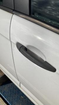 Poignee porte avant droit