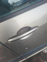 Poignee porte avant droit
