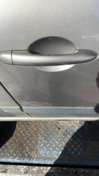 Poignee porte avant droit