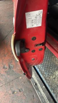 Poignee porte avant gauche