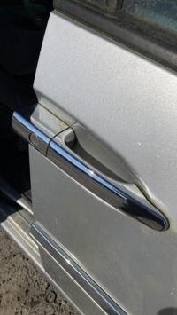 Poignee porte avant droit