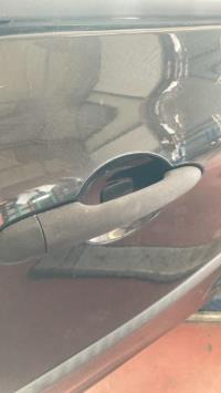 Poignee porte avant droit