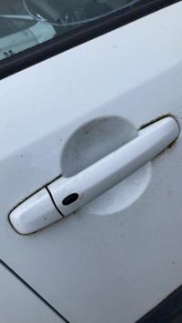 Poignee porte avant droit